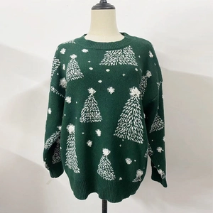 Détails du pull de Noël vert foncé avec motifs de flocons de neige et poignets côtelés