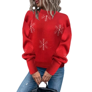 Festive red Christmas sweater with white snowflake patterns and cozy crew neck for winter