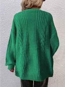 Detailed back view of green cable knit cardigan featuring relaxed drop shoulder fit