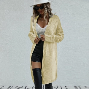 Detailed texture of light beige knit cardigan featuring an open front and long sleeves