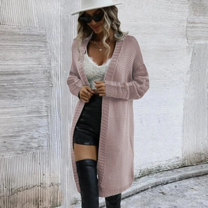 Detail of mauve oversized knit cardigan showing thick texture and ribbed cuffs for women