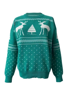 Detail view of green Christmas knit sweater with white reindeer and snowflake patterns