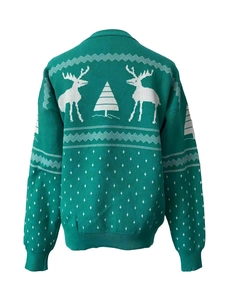 Detail view of the back of a green Christmas sweater with white reindeer and tree patterns