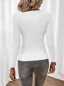 Close-up back view of a slim fit white ribbed knit sweater for women with long sleeves