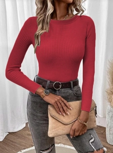 Close-up of red ribbed knit sweater with crew neck and premium stretch fabric texture