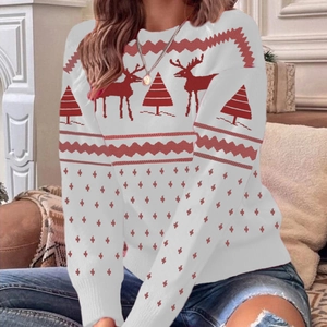 Women's Christmas knit sweater with red reindeer and tree patterns on white background