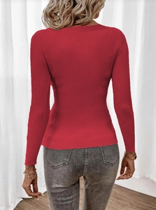Detail showing the back view of a red long-sleeve knit sweater with a slim rib texture