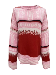 Pink and red color-block knitted sweater with white jacquard festive patterns on white background