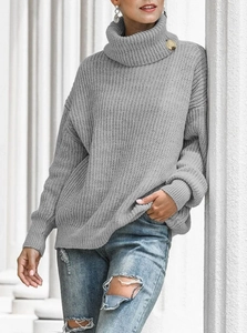 Oversized grey turtleneck sweater for women with chunky knit and gold button detail