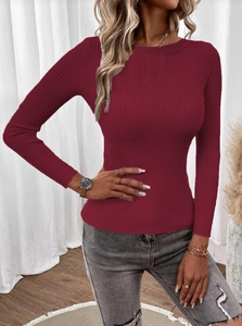 Detail shot of the ribbed knit fabric and round neck on this burgundy long sleeve sweater