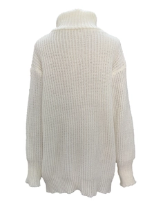Back view of thick knit off-white turtleneck sweater with ribbed cuffs and loose fit