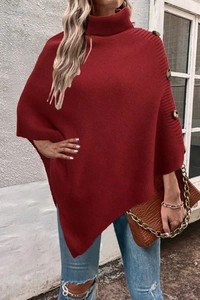 Chic dark red turtleneck knit poncho sweater with side button details and asymmetrical hem