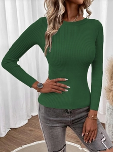 Detail shot of the vertical ribbed texture on a slim dark green knit sweater for women