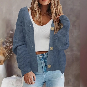 Women's blue chunky knit cardigan with wooden buttons and dropped shoulders for casual wear