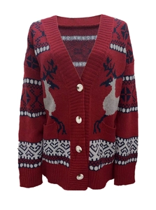 Detailed knit texture of a red Christmas cardigan with reindeer and snowflake patterns