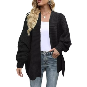 Women's black oversized chunky knit cardigan featuring drop shoulder and loose open front fit