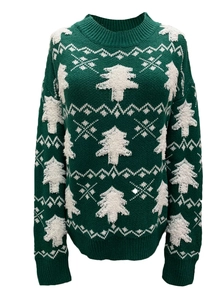 Detail of dark green Christmas sweater featuring textured white tree patterns and snowflakes