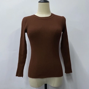 Detailed view of brown ribbed knit sweater featuring a round neck and slim fit texture