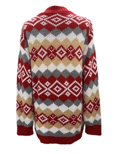 Close-up of geometric diamond jacquard knit pattern on the back of red Christmas cardigan