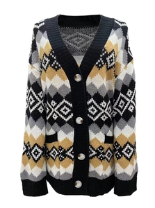 Detail of V-neck knit cardigan with geometric wave pattern and light color buttons