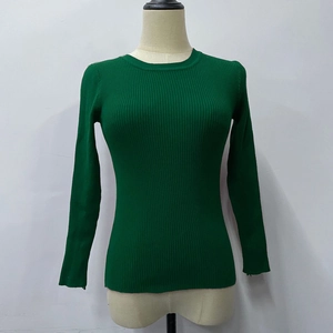 Detail of dark green ribbed knit texture on a long sleeve crew neck slim fit sweater