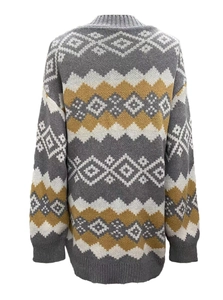 Close-up of geometric Fair Isle knit pattern on gray and yellow Christmas cardigan