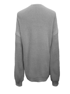 Back view of grey chunky knit cardigan with ribbed cuffs and dropped shoulder design
