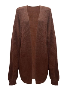 Close-up of thick ribbed knit texture on long chocolate brown cardigan for women
