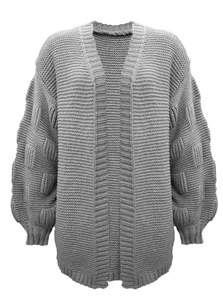 Detail of dark grey oversized knit cardigan showing chunky texture and lantern sleeves