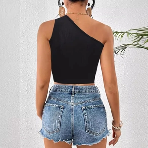 Rear view of a black one-shoulder ribbed crop top showing detailed knit texture and fit