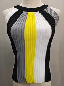 Detail of color-block ribbed knit texture on a sleeveless slim-fit top for women