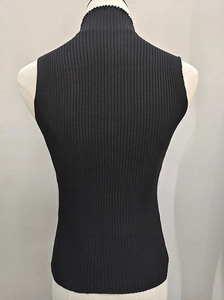 Detail of black ribbed knit high neck sleeveless top showing back texture on mannequin