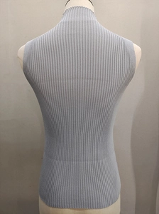 Macro shot of light gray ribbed knit high neck sleeveless top showing back detail