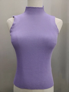 Detail of purple mock-neck sleeveless top featuring a vertical ribbed knit texture