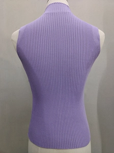 Detail shot of light purple mock neck knit vest showing vertical ribbed texture and slim fit