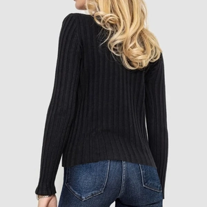Detail view of the back of a black ribbed knit long sleeve sweater for women