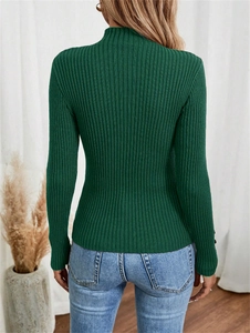 Rear view of a dark green ribbed mock neck sweater with a slim fit silhouette