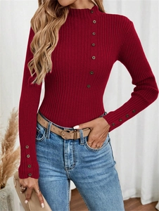 Detail view of burgundy ribbed knit sweater with decorative buttons and mockup turtle neck