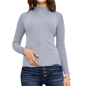 Women's light grey-purple high-neck ribbed knit sweater paired with blue high-waisted jeans
