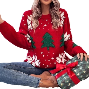 Red Christmas knit sweater with green tree and snowflakes on white background