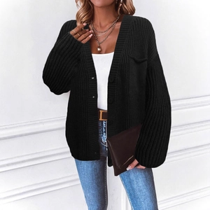 Women's black knit button-up cardigan sweater featuring textured fabric and relaxed fit