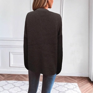 Back view of a loose ribbed knit cardigan featuring dropped shoulders and casual style