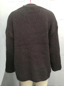 Back view of a chunky dark brown ribbed knit cardigan featuring loose dropped shoulders