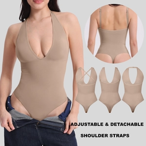 Detail of adjustable detachable straps on a deep V-neck backless bodysuit in beige