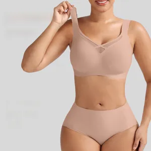Detail of plus size seamless bra set with mesh panel and jelly strip support in beige