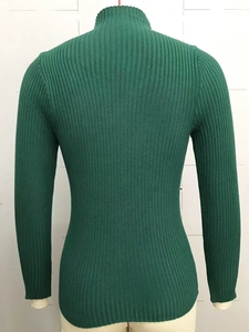 Detailed back view of dark green ribbed knit sweater with a sophisticated high neckline