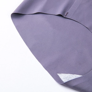 Detail view of seamless heat-pressed edges and breathable cotton crotch on mauve panties