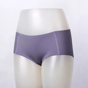 Detail of seamless purple women's underwear showing the smooth elastic fabric and hip-lifting cut