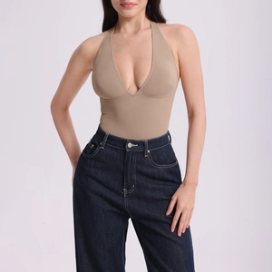 Detail of high-stretch halter neck bodysuit with deep V-neck and khaki shaping fabric