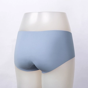Detail of light blue seamless panties for women featuring laser-cut edges and smooth fit